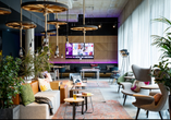 Finden Sie Ihren Lieblingsplatz im gemütlichen Barbereich des Hotels.