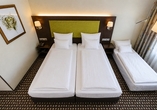 Beispielbild eines Doppelzimmers Comfort mit Zustellbett