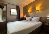 Beispiel eines Doppelzimmers im Beispielhotel Hôtel Kyriad Le Bourget Centre - Parc de Expositions