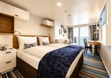 Beispiel einer Balkonkabine an Bord der Mein Schiff 3 | KI bearbeitet