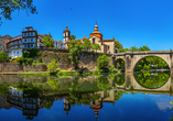 Entdecken Sie Amarante mit der historischen Ponte de São Gonçalo am Fluss Tâmega.