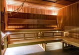Die Sauna bietet wohltuende Wärme und lädt zu entspannten Wohlfühlmomenten ein.