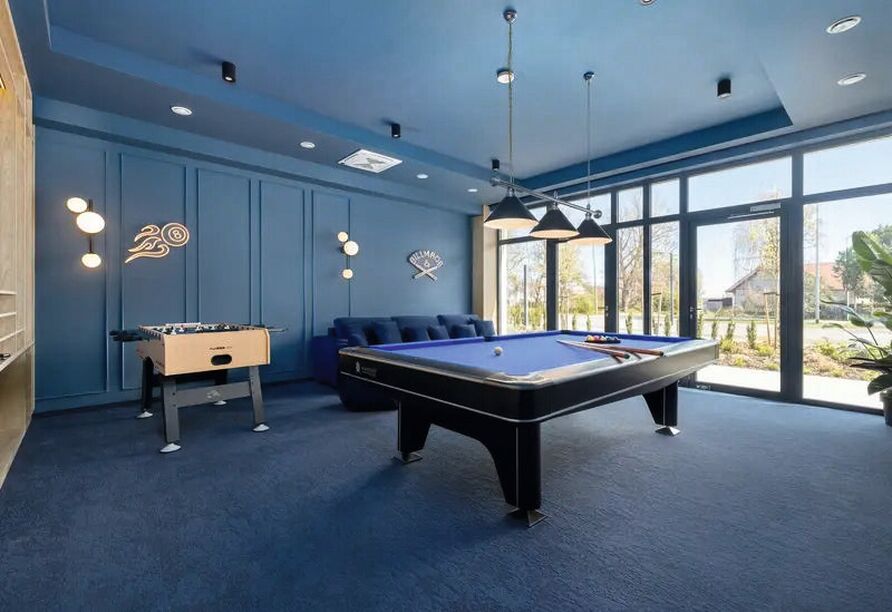 Billard, Kicker und weitere Unterhaltungsmöglichkeiten sorgen im Spielraum für abwechslungsreiche Stunden.