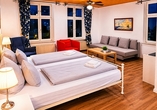 Beispielbild eines Doppelzimmers mit Zustellbett | KI bearbeitet