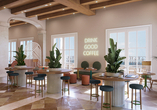 Im Cocoa Café liegen Snacks, Gebäck und Kaffeespezialitäten für Sie bereit.