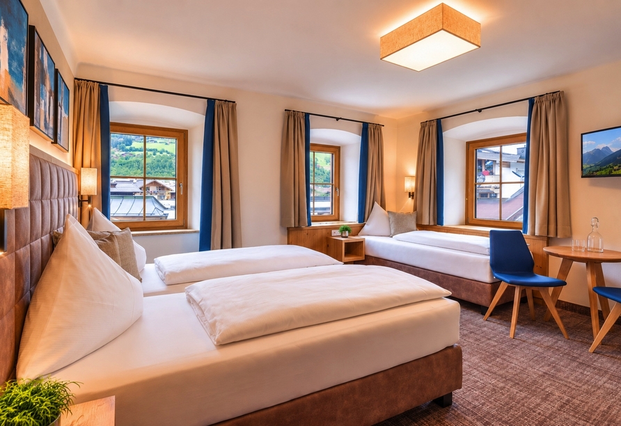 Beispielbild eines Doppelzimmers mit Zustellbett | KI bearbeitet
