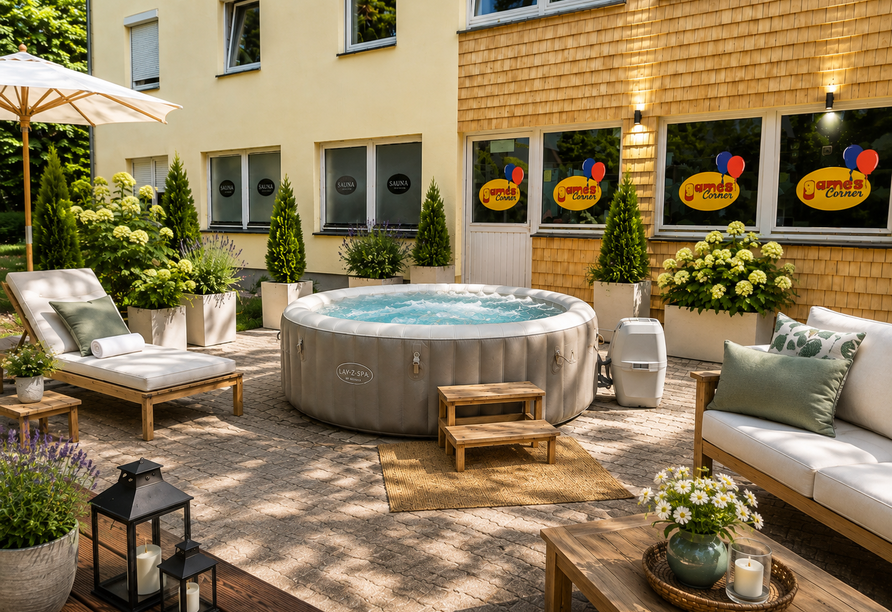 Nutzen Sie den Whirlpool auf der Terrasse.