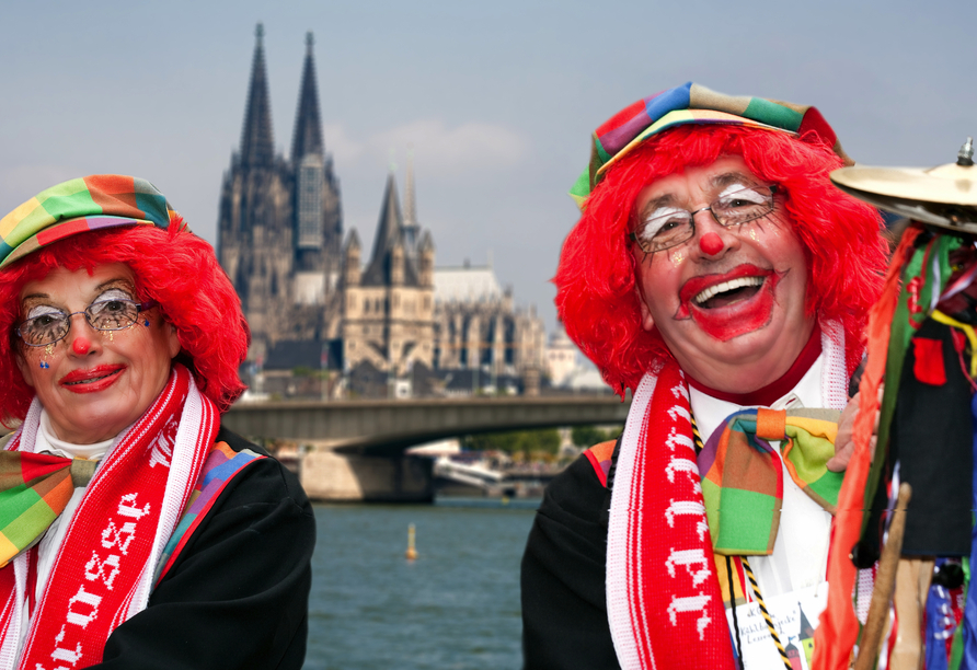 Besuchen Sie die Karnevalshochburg Köln.